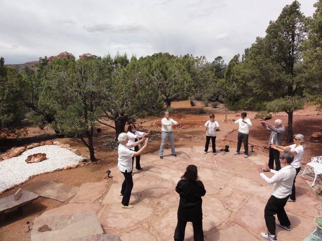 Group Qigong class outdoors in Sedona